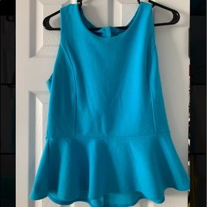 Blue sleeveless peplum top
